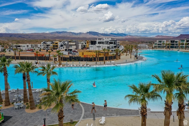 5399 S Cerulean Ln Unit 95, St George, UT 84790 - community pool featuring a mountain view and fence