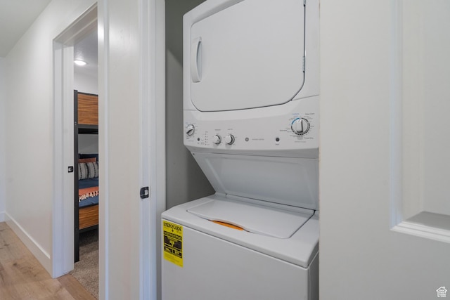 5399 S Cerulean Ln Unit 95, St George, UT 84790 - washroom featuring baseboards, laundry area, and stacked washer / drying machine