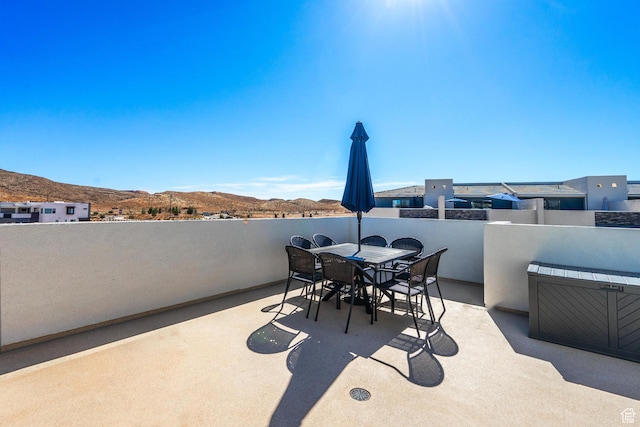 5399 S Cerulean Ln Unit 95, St George, UT 84790 - view of patio with outdoor dining space and a mountain view