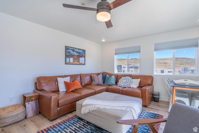 5399 S Cerulean Ln Unit 95, St George, UT 84790 - living room with light wood finished floors, baseboards, and a ceiling fan