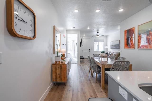 5399 S Cerulean Ln Unit 95, St George, UT 84790 - dining area with recessed lighting, baseboards, a textured ceiling, light wood-style floors, and a ceiling fan