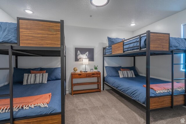 5399 S Cerulean Ln Unit 95, St George, UT 84790 - bedroom featuring carpet flooring and a textured ceiling