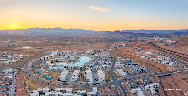 5399 S Cerulean Ln Unit 95, St George, UT 84790 - aerial view at dusk with a mountain view