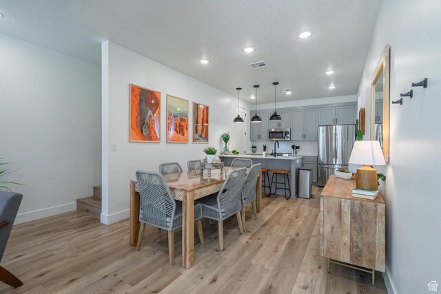 5399 S Cerulean Ln Unit 95, St George, UT 84790 - dining area featuring light wood-style flooring, recessed lighting, baseboards, and visible vents