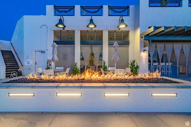 5399 S Cerulean Ln Unit 95, St George, UT 84790 - exterior space featuring an outdoor fire pit