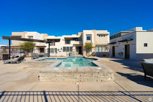5399 S Cerulean Ln Unit 95, St George, UT 84790 - view of pool featuring a swimming pool, fence, and a patio