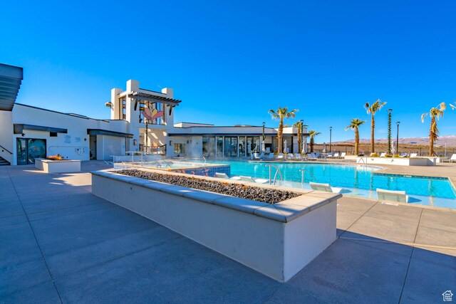 5399 S Cerulean Ln Unit 95, St George, UT 84790 - community pool featuring a patio area