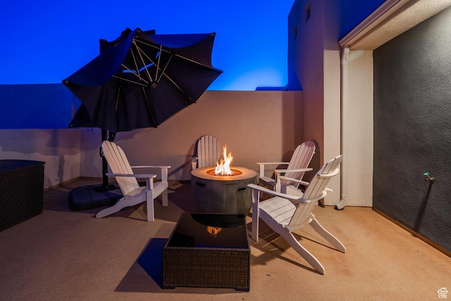 5399 S Cerulean Ln Unit 95, St George, UT 84790 - view of patio featuring a fire pit
