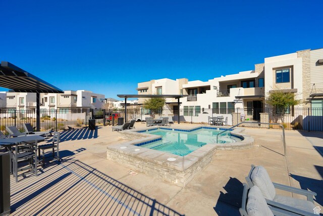 5399 S Cerulean Ln Unit 95, St George, UT 84790 - view of pool with fence, a patio area, and a residential view