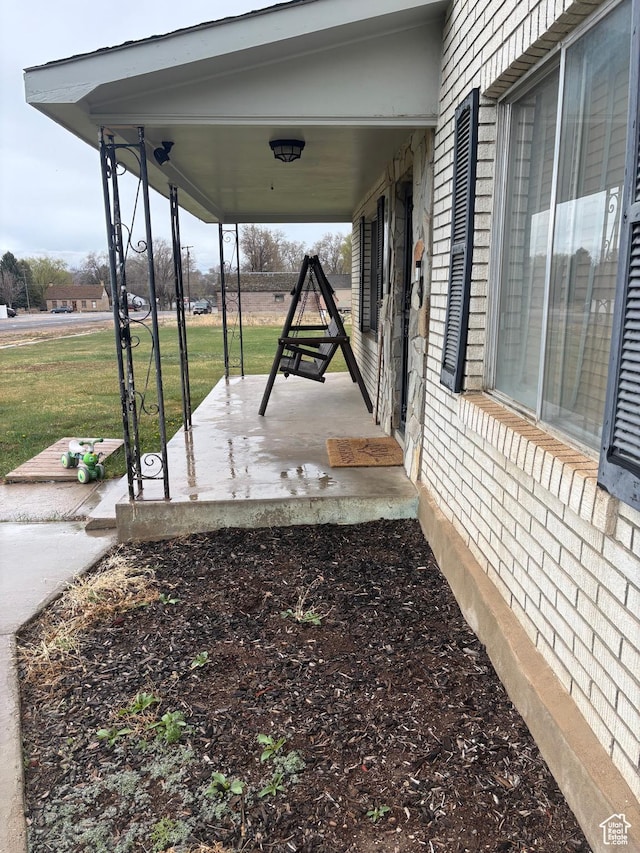 view of patio featuring covered porch