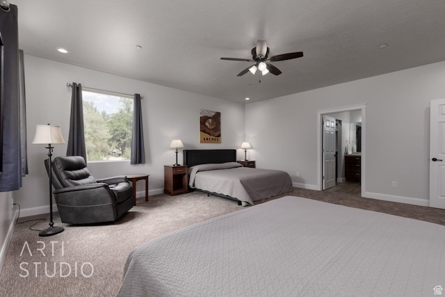 bedroom with baseboards, ensuite bath, recessed lighting, and carpet