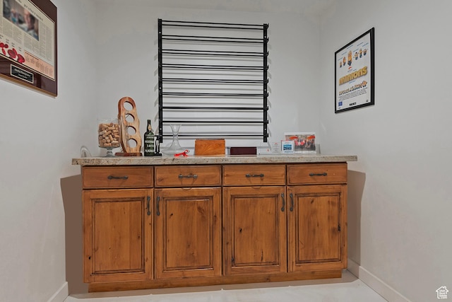 5888 E Pioneer Fork Rd N, Salt Lake City, UT 84108 - bar featuring baseboards and bar