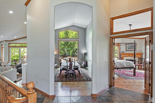 5888 E Pioneer Fork Rd N, Salt Lake City, UT 84108 - foyer entrance featuring baseboards, stone tile flooring, and a healthy amount of sunlight