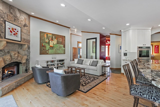 5888 E Pioneer Fork Rd N, Salt Lake City, UT 84108 - living area with a fireplace, light wood-style floors, and ornamental molding