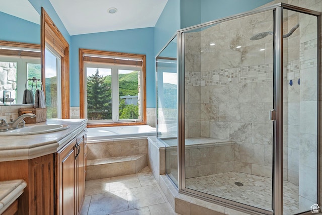 5888 E Pioneer Fork Rd N, Salt Lake City, UT 84108 - bathroom with a shower stall, vaulted ceiling, vanity, and a bath