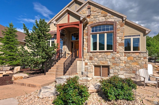 view of front of home featuring stone siding
