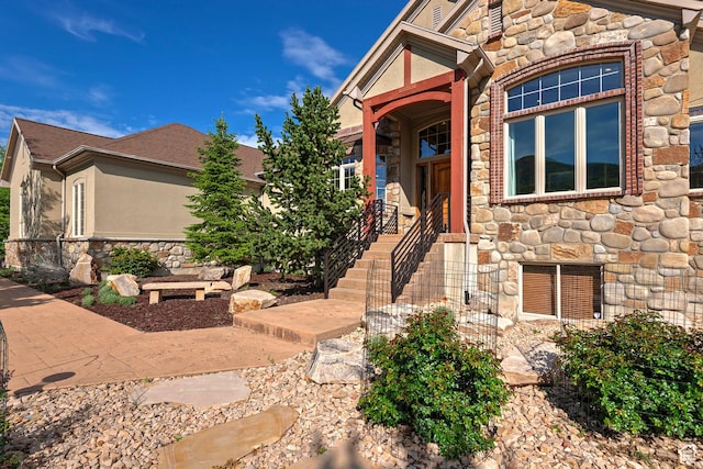 5888 E Pioneer Fork Rd N, Salt Lake City, UT 84108 - view of front of home featuring stone siding