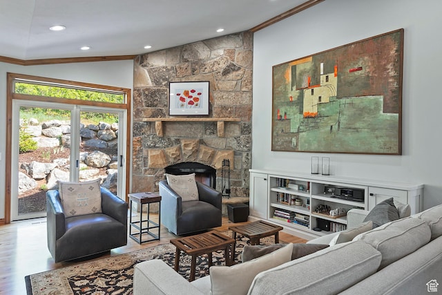 5888 E Pioneer Fork Rd N, Salt Lake City, UT 84108 - living room featuring vaulted ceiling, crown molding, a fireplace, wood finished floors, and recessed lighting