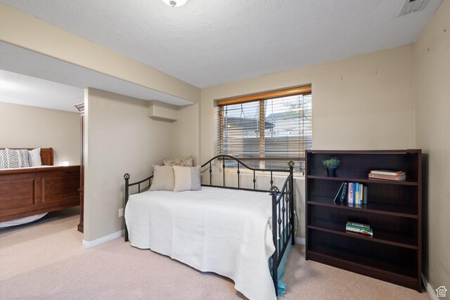 13968 S Hawberry Rd E, Draper, UT 84020 - carpeted bedroom featuring a textured ceiling, baseboards, and visible vents