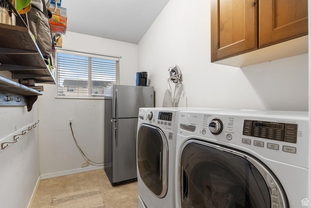 13968 S Hawberry Rd E, Draper, UT 84020 - washroom featuring cabinet space, washing machine and dryer, baseboards, and light floors