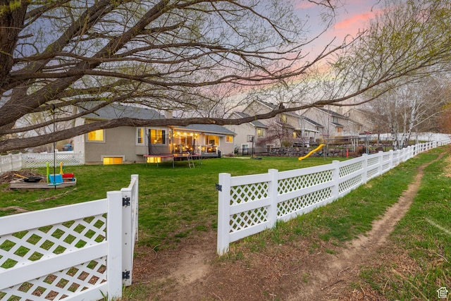 13968 S Hawberry Rd E, Draper, UT 84020 - view of yard featuring a fenced backyard, a playground, and a trampoline