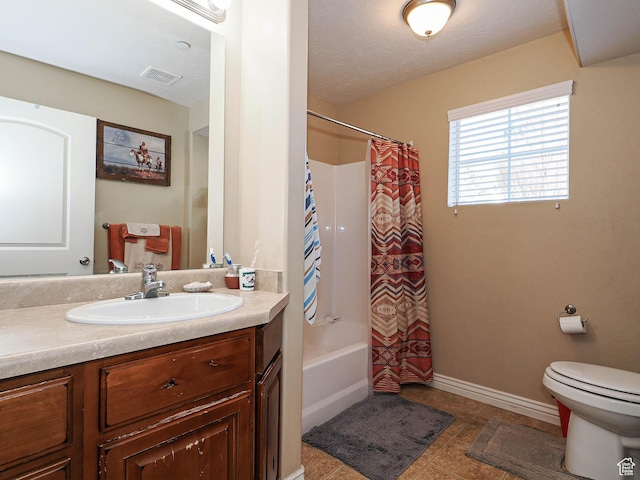 full bath featuring vanity, toilet, baseboards, visible vents, and shower / bath combination with curtain