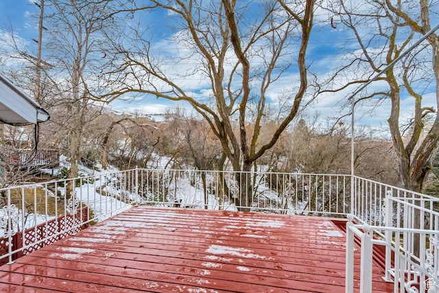 view of snow covered deck
