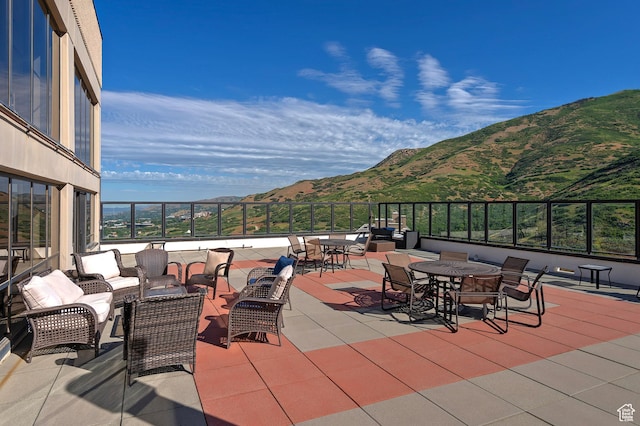 3125 E Kennedy Dr S Unit 605, Salt Lake City, UT 84108 - view of patio / terrace featuring a mountain view and an outdoor living space