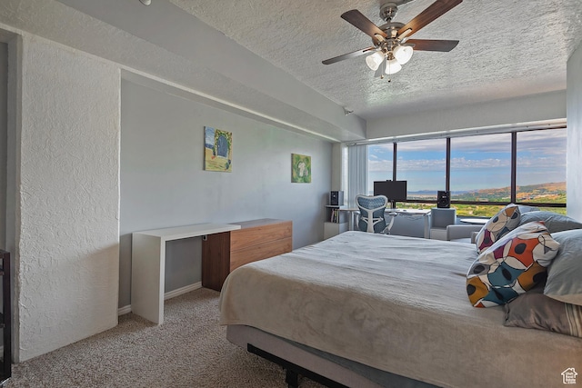 3125 E Kennedy Dr S Unit 605, Salt Lake City, UT 84108 - carpeted bedroom featuring a textured wall, baseboards, ceiling fan, and a textured ceiling
