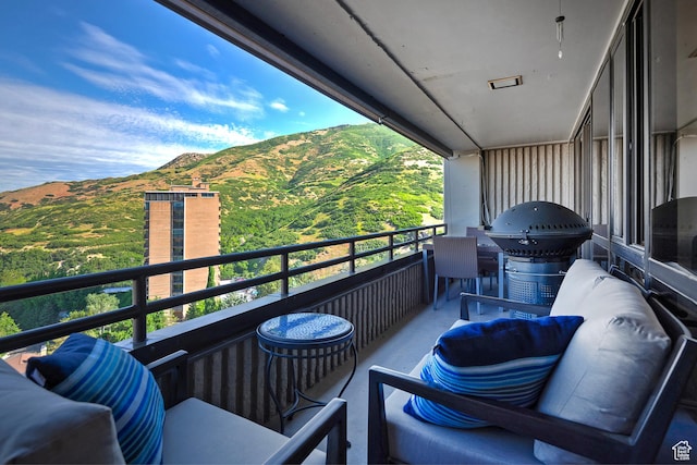 3125 E Kennedy Dr S Unit 605, Salt Lake City, UT 84108 - balcony with grilling area and a mountain view