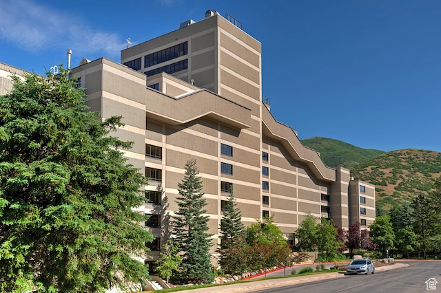 3125 E Kennedy Dr S Unit 605, Salt Lake City, UT 84108 - view of building exterior with a mountain view
