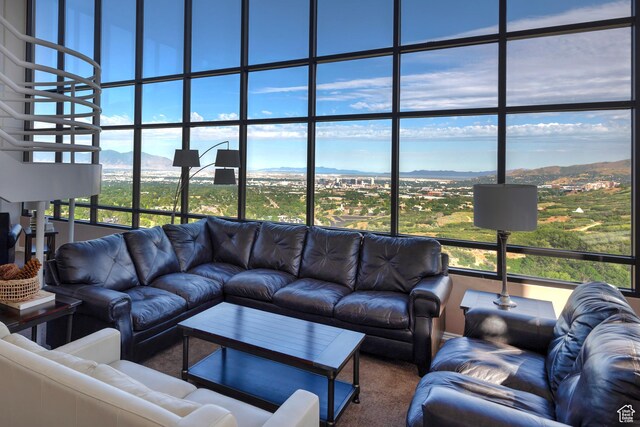 3125 E Kennedy Dr S Unit 605, Salt Lake City, UT 84108 - living room with carpet flooring and a mountain view