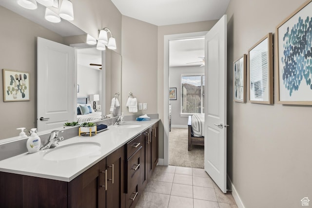 429 N 600 W, Moab, UT 84532 - ensuite bathroom featuring double vanity, a sink, tile patterned floors, and ensuite bath