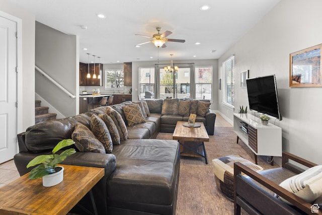 429 N 600 W, Moab, UT 84532 - living room featuring light tile patterned flooring, stairway, baseboards, ceiling fan with notable chandelier, and recessed lighting