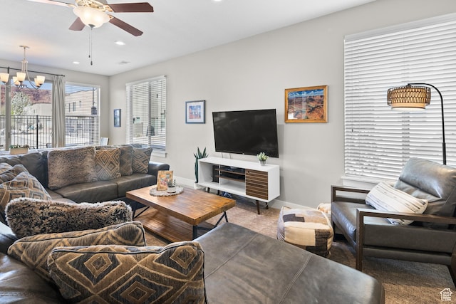 429 N 600 W, Moab, UT 84532 - living area with baseboards, carpet flooring, recessed lighting, and ceiling fan with notable chandelier
