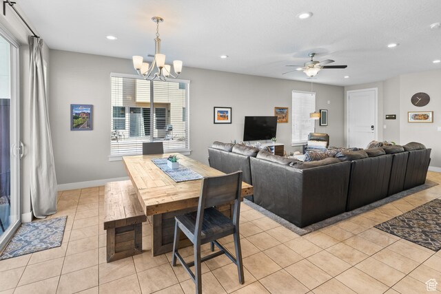 429 N 600 W, Moab, UT 84532 - dining space with baseboards, recessed lighting, light tile patterned floors, and ceiling fan with notable chandelier