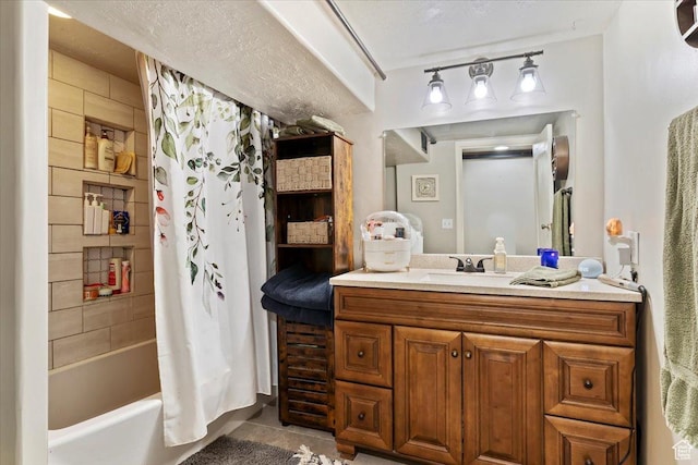 full bathroom with tile patterned floors, vanity, and shower / bath combo with shower curtain