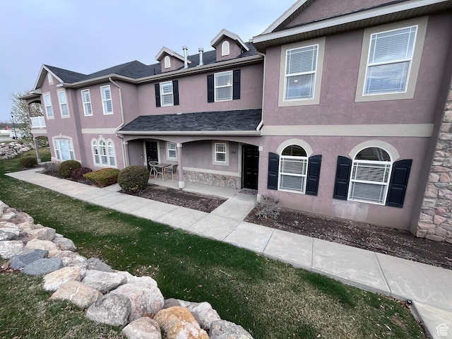5262 W Cool Water Way, West Jordan, UT 84081 - townhome / multi-family property featuring stucco siding, stone siding, and a patio