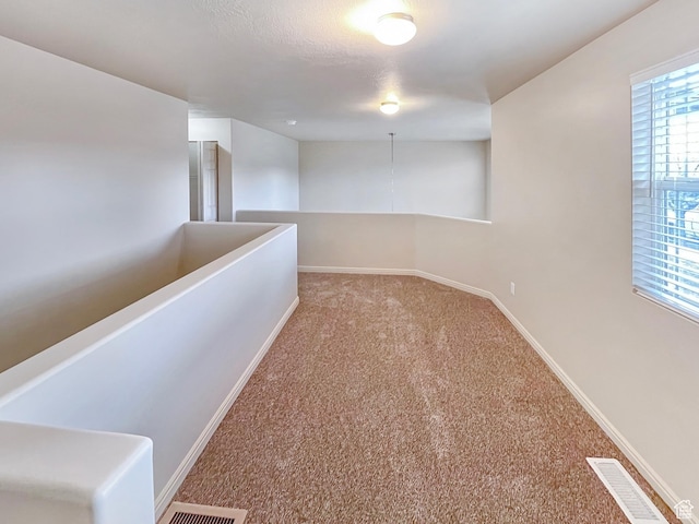 5262 W Cool Water Way, West Jordan, UT 84081 - carpeted spare room featuring baseboards and visible vents