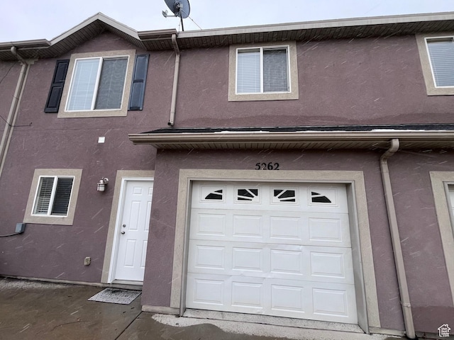 5262 W Cool Water Way, West Jordan, UT 84081 - exterior space featuring a garage and stucco siding