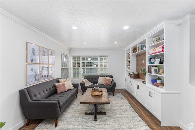 living area with dark wood-style flooring, crown molding, baseboards, and a textured ceiling