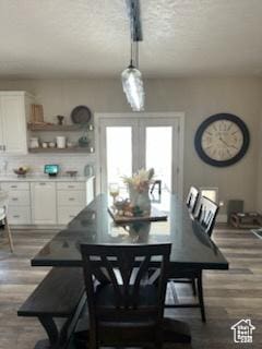 4190 W Delray N Unit 39, Vernal, UT 84078 - dining room with a textured ceiling and wood finished floors