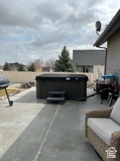 4190 W Delray N Unit 39, Vernal, UT 84078 - view of patio with fence and a hot tub