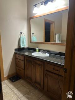 4190 W Delray N Unit 39, Vernal, UT 84078 - bathroom featuring tile patterned flooring and vanity