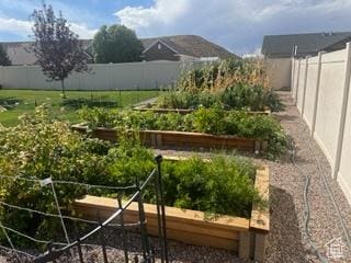 4190 W Delray N Unit 39, Vernal, UT 84078 - view of yard with a garden and a fenced backyard