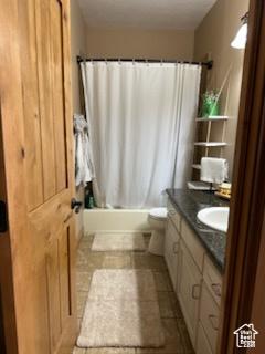 4190 W Delray N Unit 39, Vernal, UT 84078 - full bathroom featuring shower / bath combo, vanity, and toilet
