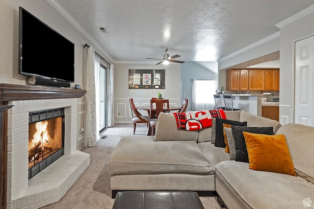 1077 E Deerwalk Ln S, Ogden, UT 84404 - living area with a ceiling fan, ornamental molding, light colored carpet, and visible vents