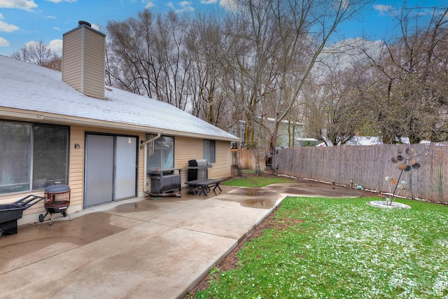 1077 E Deerwalk Ln S, Ogden, UT 84404 - view of yard featuring central AC unit, fence, and a patio