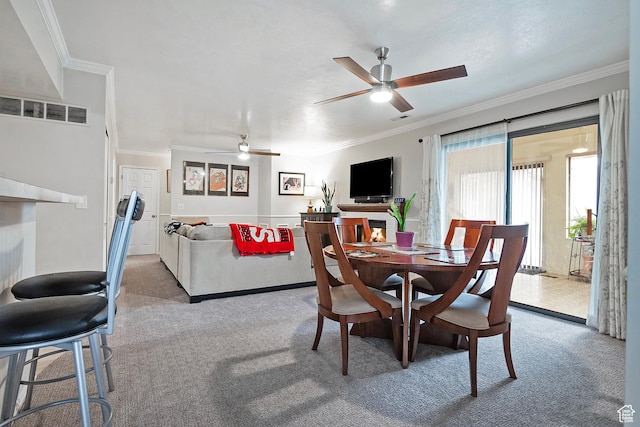 1077 E Deerwalk Ln S, Ogden, UT 84404 - dining area featuring visible vents, crown molding, carpet flooring, and a ceiling fan