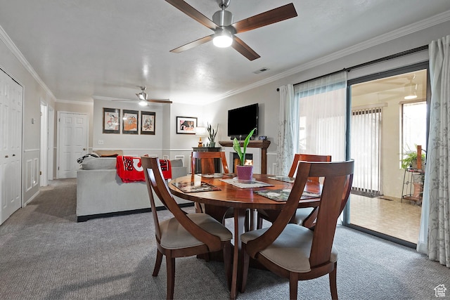 1077 E Deerwalk Ln S, Ogden, UT 84404 - carpeted dining room featuring a ceiling fan and crown molding